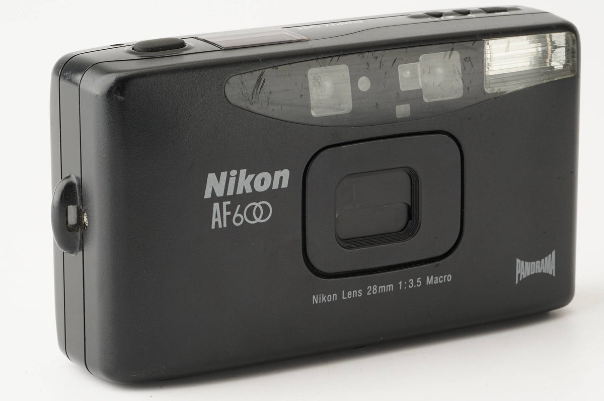 Nikon AF 600 Quartz Date / 28mm f/3.5 Macro – Natural Camera