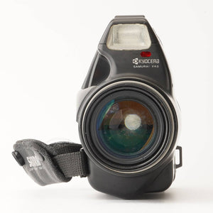 Kyocera SAMURAI X4.0 25-100mm f/3.8-4.8 / Tele Converter TL-1 1.4x