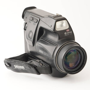 Kyocera SAMURAI X4.0 25-100mm f/3.8-4.8 / Tele Converter TL-1 1.4x