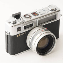 Load image into Gallery viewer, Yashica Electro 35 / Yashinon-DX 45mm f/1.7
