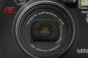 Minolta PANORAMA ZOOM 135 / ASPHERICAL 38-135mm MACRO – Natural 
